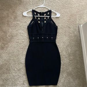 Black strappy body con dress